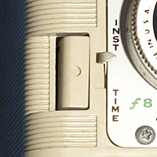 White button, white dot, switch to right labeled 'Inst' above and 'Time' below