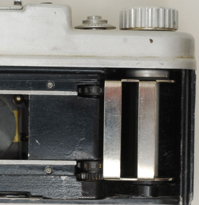 folding metal flap on takeup