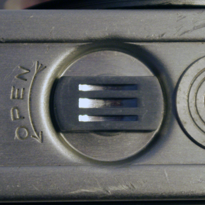 flat slotted latch in a circle