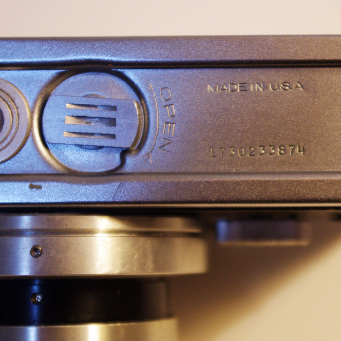 Serial number on bottom, lens facing down