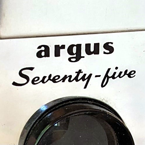 argus Seventy-five curly g